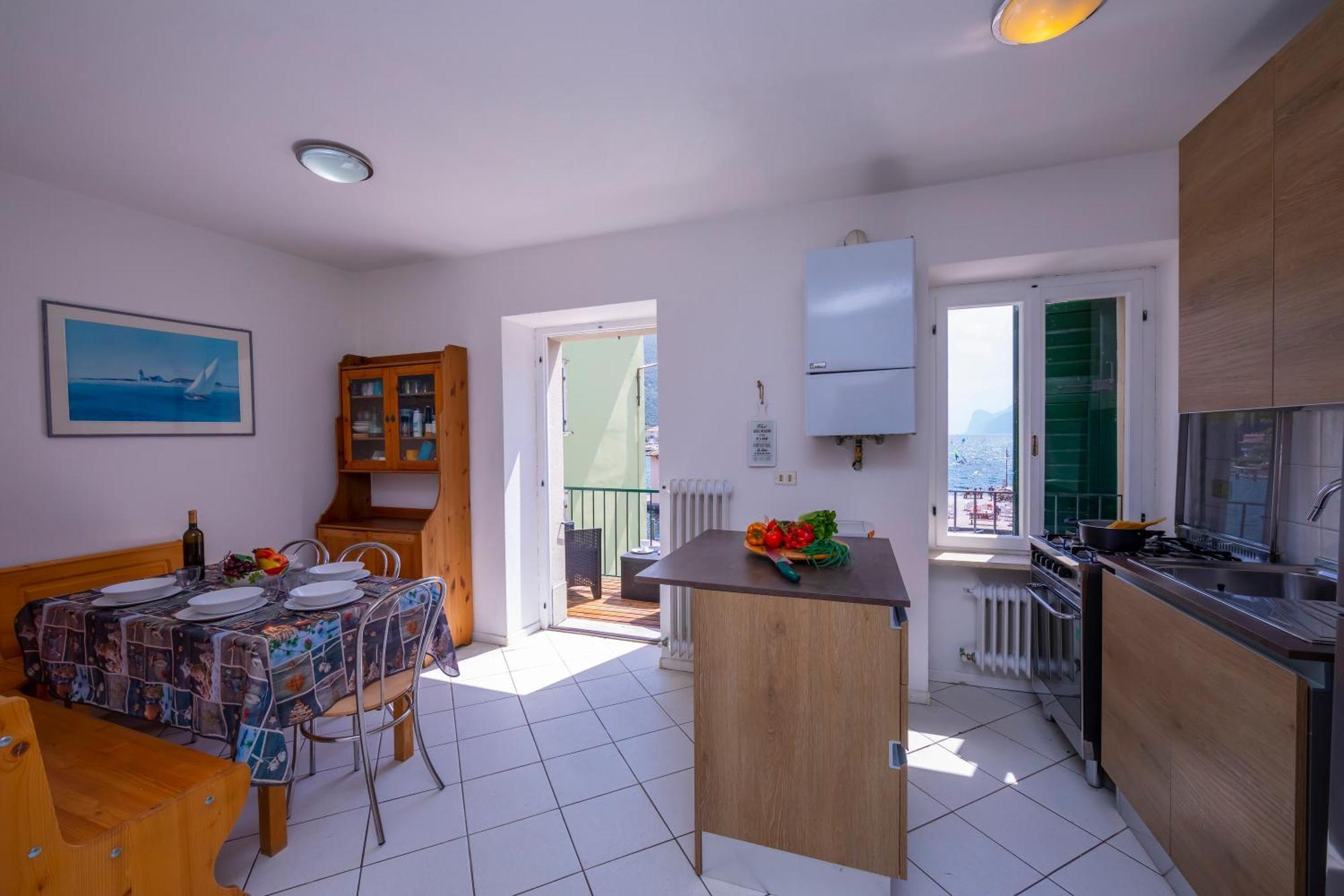 Dogana Best Lake View - Happy Rentals Torbole Sul Garda Bagian luar foto
